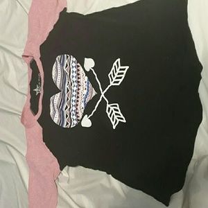 Pink and black heart shirt with crossing arrows.